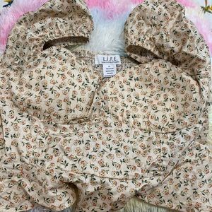Floral beige with a popcorn back crop top